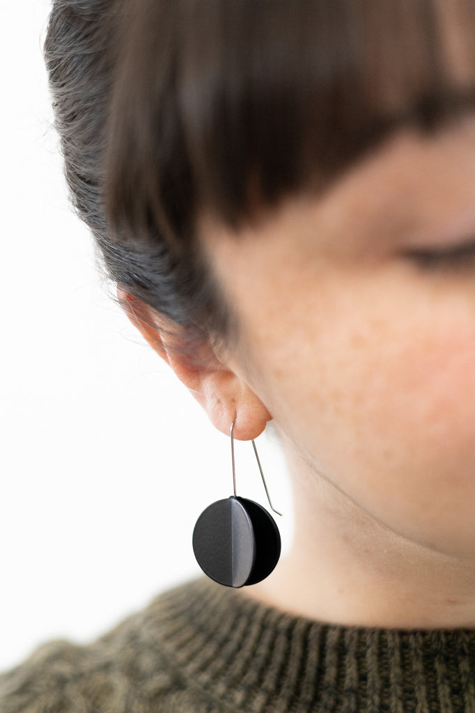 Small black earrings top